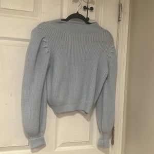 So blue knitted sweater